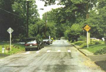 photo of a residential street with a speed bump in Montgomery County, Maryland