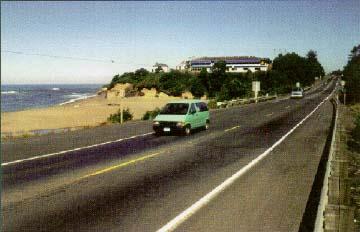 photo: US Rt. 101, Lincoln, Co, two vans driving near the ocean
