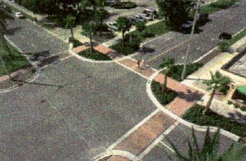 photo: aerial view of a four-way intersection