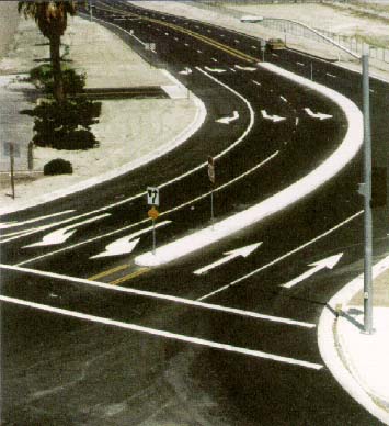 photo of an intersection with left turn lanes