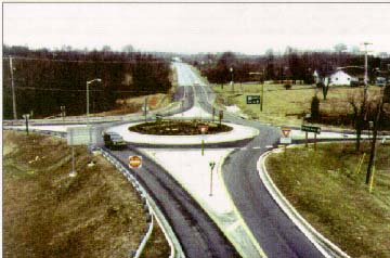 photo: four way intersection with roundabout