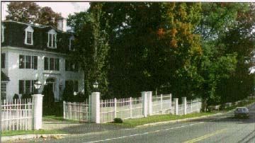 photo of a house and Rt. 123/124 in New Ipswich Village, New Hamshire