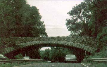 photo of the Merritt Parkway in Fairfield County, CT including a stone bridge