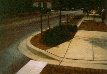 photo: sidewalk with handicap ramp