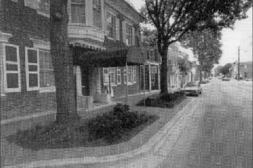 photo: mainstreet and sidewalk with trees and landscaping