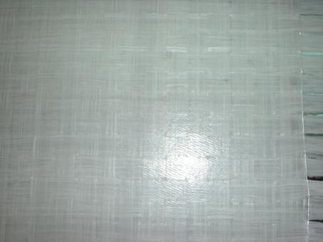 Figure 2.1.3-4 Close-up of Consolidated Woven Polypropylene/E-glass