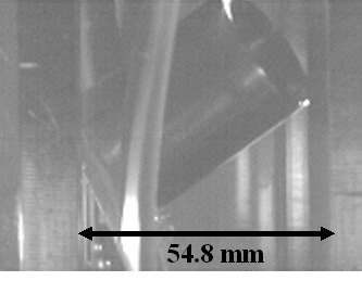 Figure 2.2.3.2-10 Sample 020919-1-65b
High-speed image showing the perforation of the sample
Kinetic Energy=142.3J
