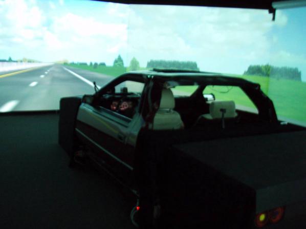 Figure 38. Simulator cab, front screen, front-right screen, and front-side screen