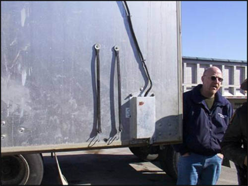 Picture of the Internal Door Lock mechanism. In this picture, the trailer door is open showing the electronically controlled locking mechanism mounted to the inside of the trailer door.