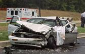 Photo of wrecked car.