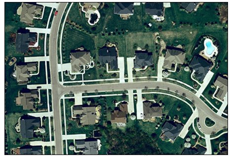 Aerial photograph of suburban neighborhood.