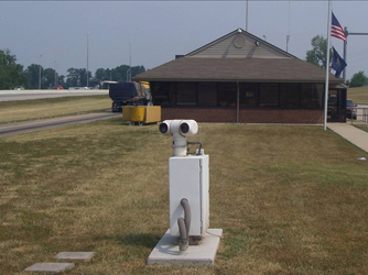 Thermal imaging camera pedestal, with scale house in the background (Laurel County, KY).