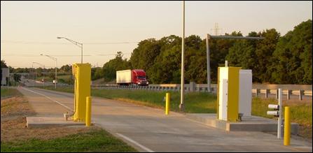 View of reduced-height radiation portal panels and more compact ISSES installation at Simpson County, Kentucky, weigh station. The license plate cameras are on the driver (highway) side of the portal lane.